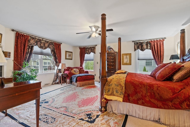 carpeted bedroom featuring a ceiling fan