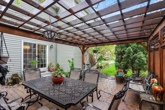 view of patio featuring outdoor dining area