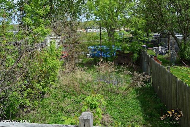 view of yard with fence