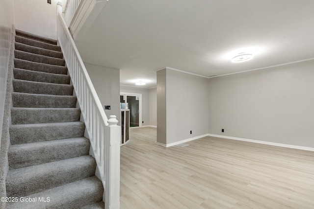 37 Nelson Ave, Rensselaer, NY 12144 - basement with light wood-type flooring, stairs, and baseboards