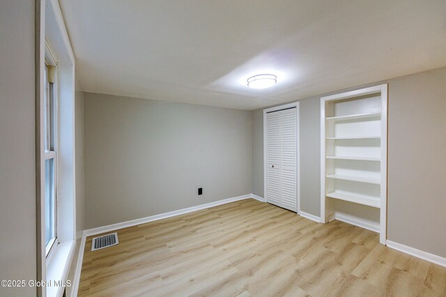 37 Nelson Ave, Rensselaer, NY 12144 - unfurnished bedroom featuring wood finished floors and baseboards