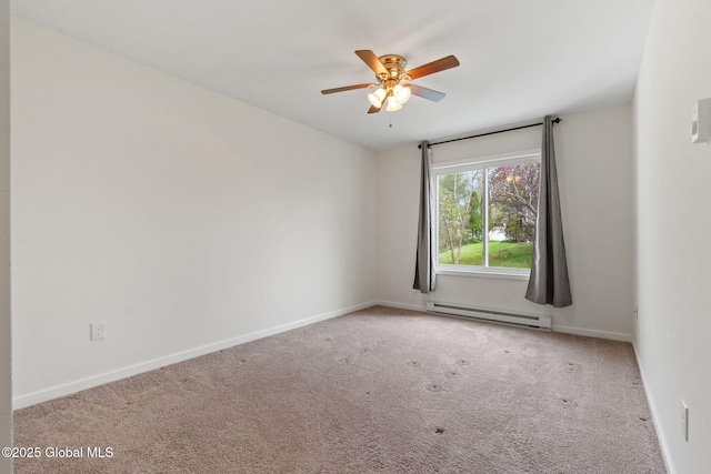 empty room with ceiling fan, carpet flooring, baseboards, and a baseboard heating unit