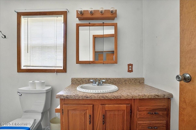 23 Hilton Dr, Moreau, NY 12803 - half bathroom featuring vanity and toilet