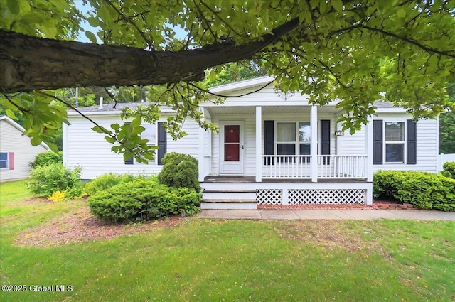 23 Hilton Dr, Moreau, NY 12803 - view of front of home with covered porch and a front yard
