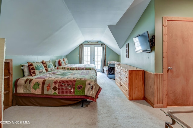 carpeted bedroom featuring vaulted ceiling