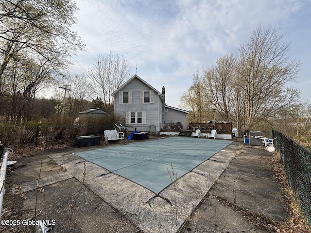 view of pool featuring a fenced in pool, a fenced backyard, and a patio area