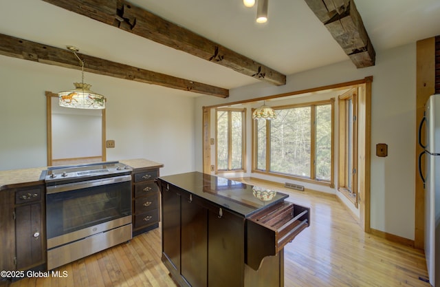 kitchen featuring dark brown cabinetry, decorative light fixtures, stainless steel electric range oven, beamed ceiling, and light wood finished floors