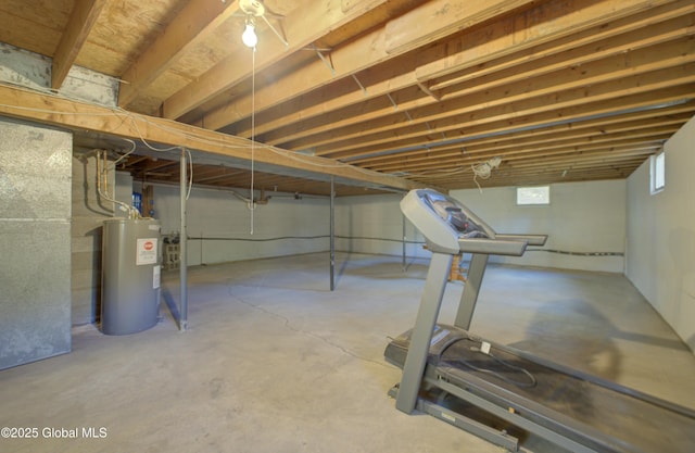 below grade area featuring water heater