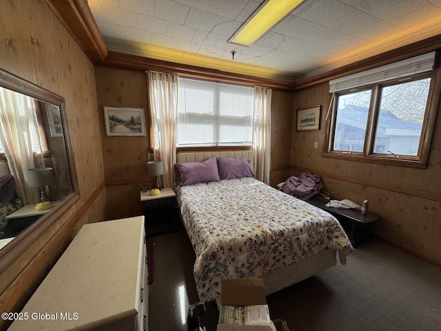 6 Spring St, Johnstown, NY 12095 - carpeted bedroom with multiple windows and wood walls