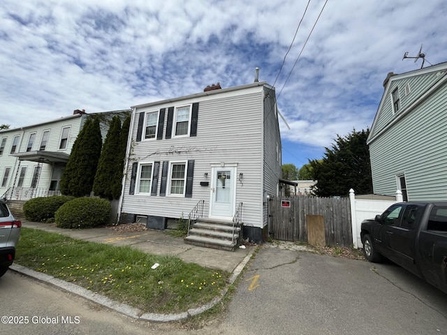 multi unit property with entry steps and fence