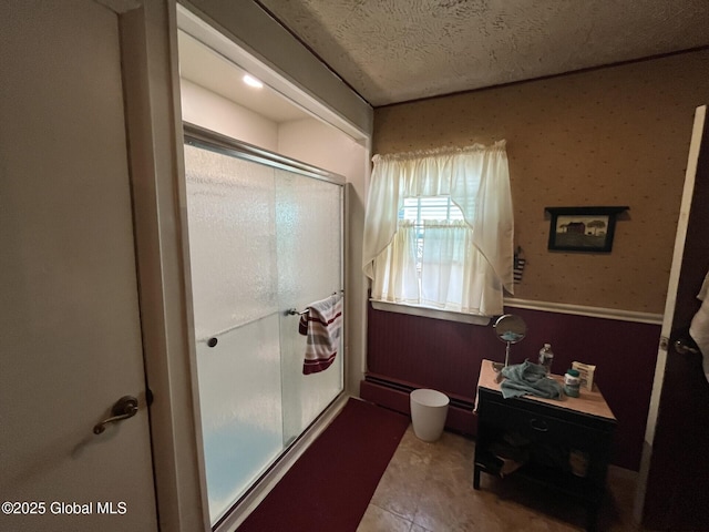 bathroom featuring a shower stall