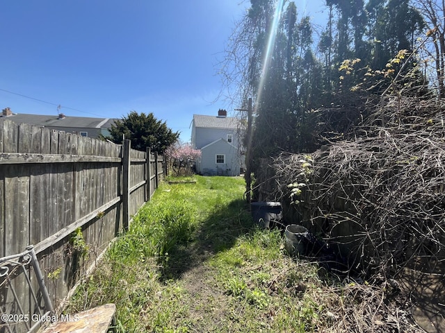 view of yard with fence