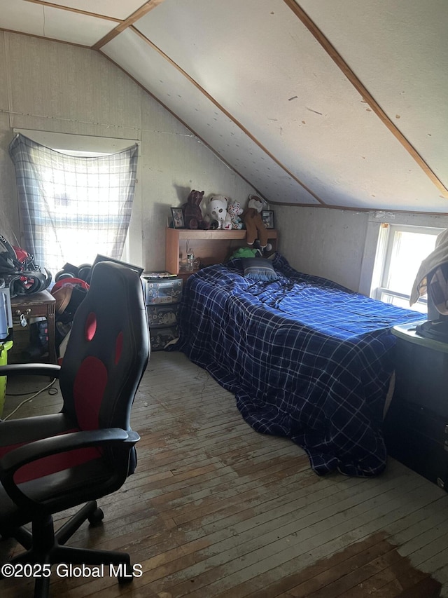 10 Valley View Ln, Moriah, NY 12956 - bedroom with lofted ceiling and hardwood / wood-style flooring