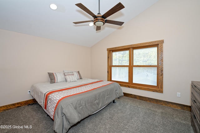 carpeted bedroom featuring a ceiling fan and lofted ceiling