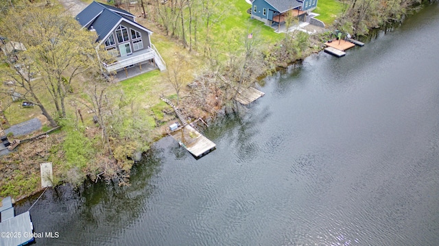 bird's eye view with a water view