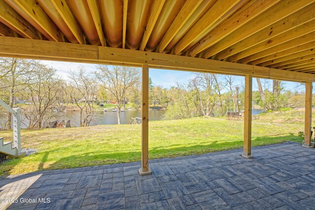 view of patio / terrace featuring a water view