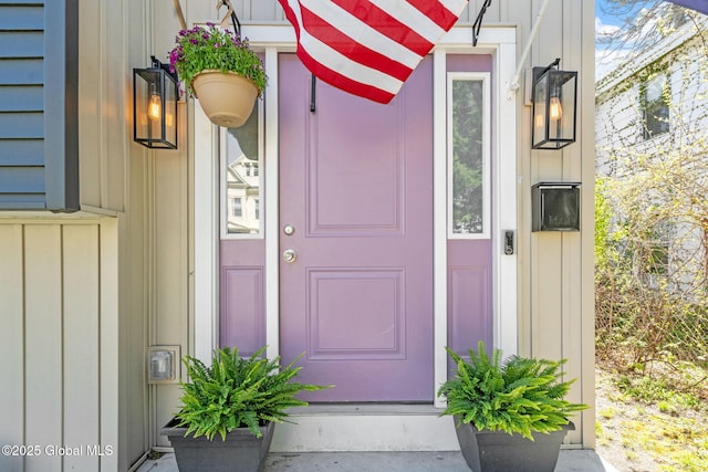 property entrance with board and batten siding