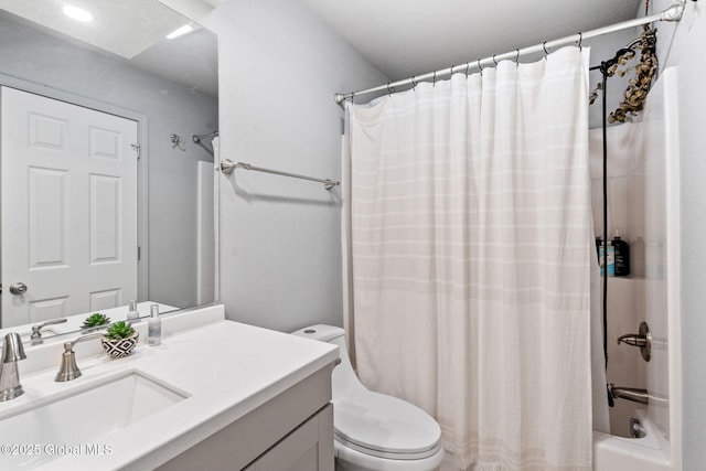 full bath with toilet, shower / tub combo with curtain, and vanity
