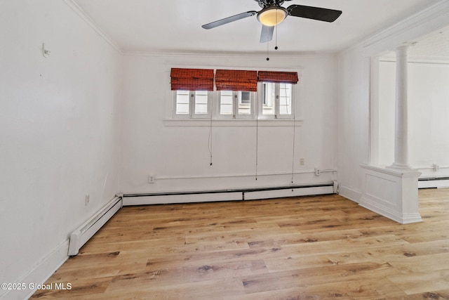 unfurnished room featuring crown molding, baseboard heating, light wood-type flooring, a baseboard radiator, and ornate columns