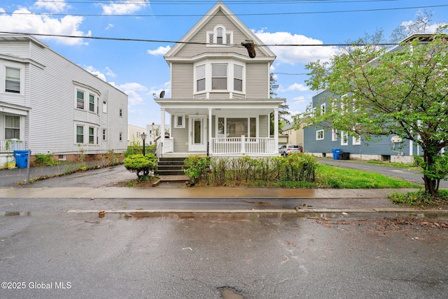 18 Bertha St, Albany, NY 12209 - victorian-style house featuring a porch