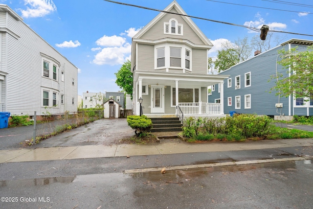 18 Bertha St, Albany, NY 12209 - view of front of property featuring covered porch and driveway