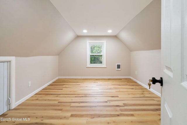 18 Bertha St, Albany, NY 12209 - bonus room with heating unit, wood finished floors, baseboards, vaulted ceiling, and recessed lighting