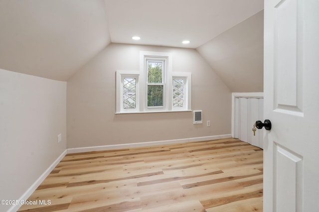 18 Bertha St, Albany, NY 12209 - additional living space featuring lofted ceiling, baseboards, and wood finished floors