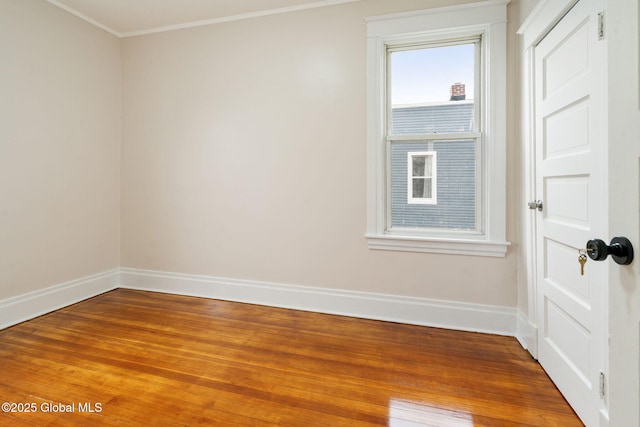 18 Bertha St, Albany, NY 12209 - empty room with light wood finished floors, crown molding, and baseboards