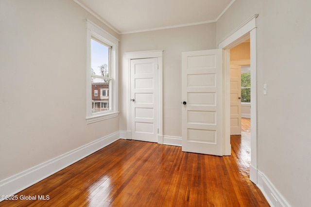18 Bertha St, Albany, NY 12209 - unfurnished room featuring baseboards, ornamental molding, and dark wood-style floors