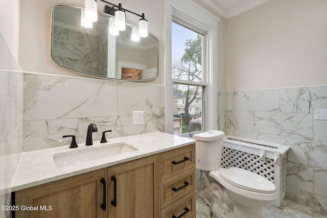 18 Bertha St, Albany, NY 12209 - bathroom with toilet, a wainscoted wall, tile walls, crown molding, and vanity