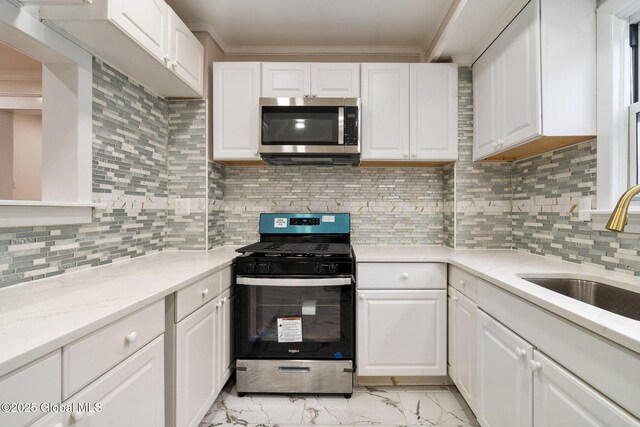 18 Bertha St, Albany, NY 12209 - kitchen featuring a sink, ornamental molding, marble finish floor, and appliances with stainless steel finishes