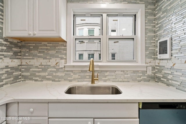 18 Bertha St, Albany, NY 12209 - kitchen featuring a sink, white cabinets, light stone countertops, backsplash, and dishwasher
