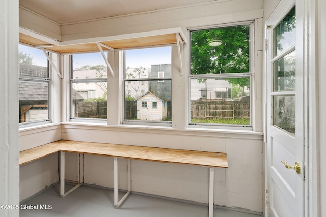 18 Bertha St, Albany, NY 12209 - unfurnished sunroom featuring concrete flooring