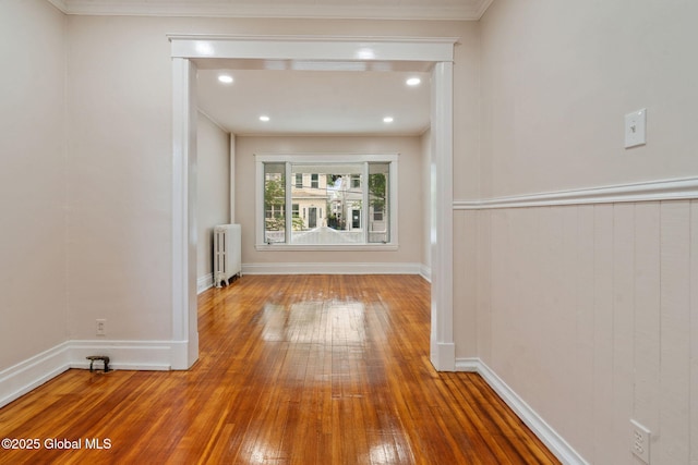 18 Bertha St, Albany, NY 12209 - hall with crown molding, wood-type flooring, and radiator heating unit