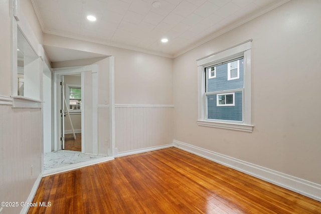 18 Bertha St, Albany, NY 12209 - unfurnished room featuring baseboards, ornamental molding, and wood-type flooring