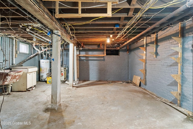 18 Bertha St, Albany, NY 12209 - basement with brick wall, water heater, and a sink
