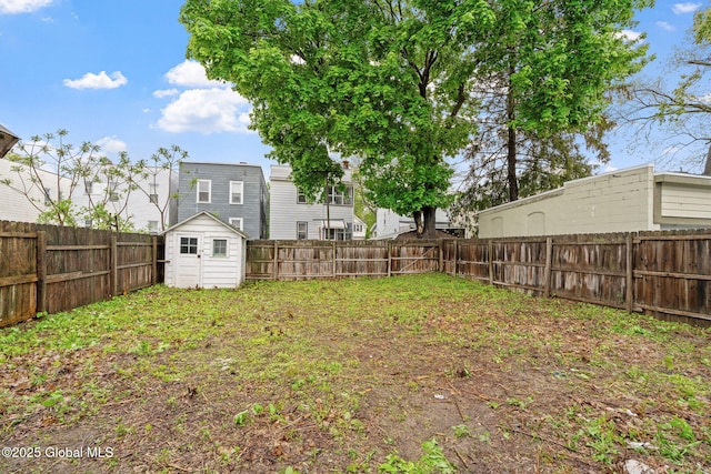 18 Bertha St, Albany, NY 12209 - view of yard with a storage shed, an outbuilding, and a fenced backyard