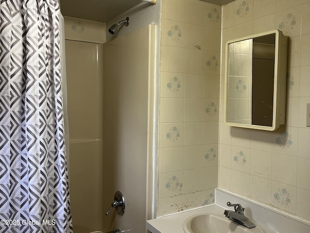 full bathroom with vanity and shower / tub combo with curtain