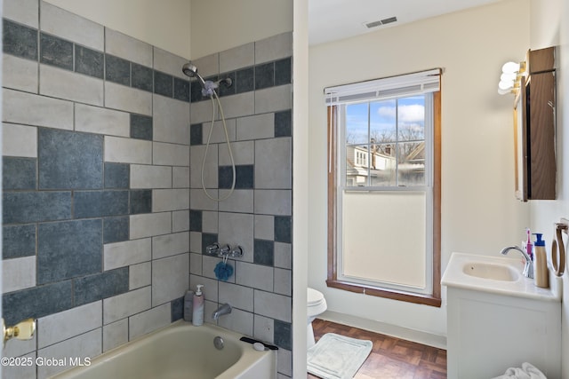 100 3rd St, Waterford, NY 12188 - bathroom with vanity, toilet, visible vents, and bathtub / shower combination