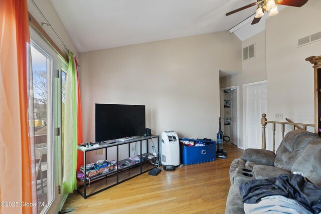 100 3rd St, Waterford, NY 12188 - living room with ceiling fan, visible vents, wood finished floors, and high vaulted ceiling