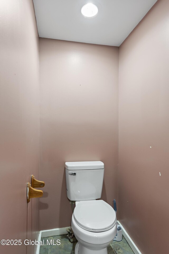 100 3rd St, Waterford, NY 12188 - bathroom featuring baseboards and toilet