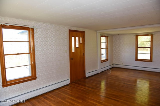 foyer entrance with crown molding, wood finished floors, baseboards, wallpapered walls, and a baseboard radiator