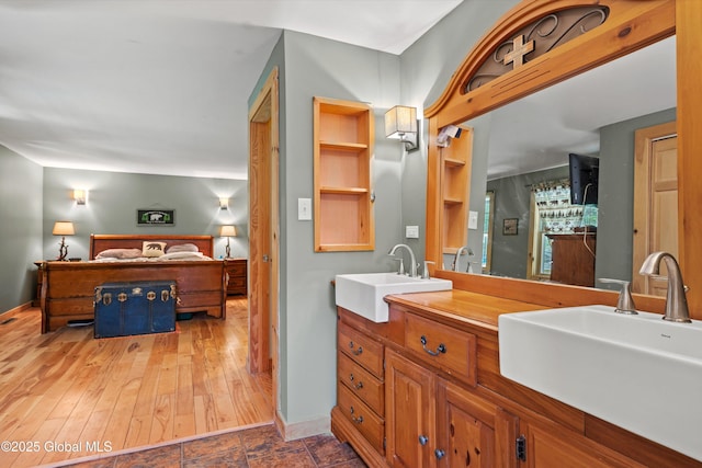 3550 Boyhaven Rd, Middle Grove, NY 12850 - full bath featuring double vanity, a sink, baseboards, and ensuite bathroom