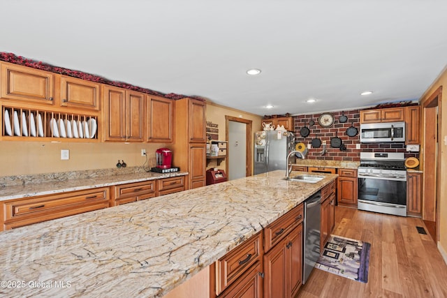 3550 Boyhaven Rd, Middle Grove, NY 12850 - kitchen featuring backsplash, brown cabinets, a sink, stainless steel appliances, and recessed lighting