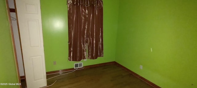 55 Watervliet Ave, Albany, NY 12206 - unfurnished room with baseboards, dark wood-style floors, and visible vents