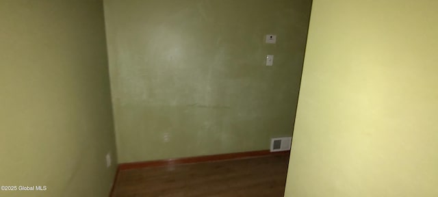 55 Watervliet Ave, Albany, NY 12206 - spare room featuring baseboards, wood finished floors, and visible vents