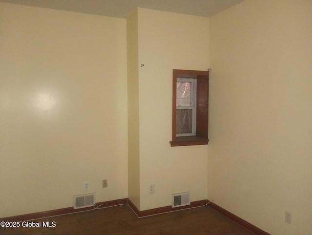 55 Watervliet Ave, Albany, NY 12206 - unfurnished room featuring visible vents, baseboards, and dark wood finished floors