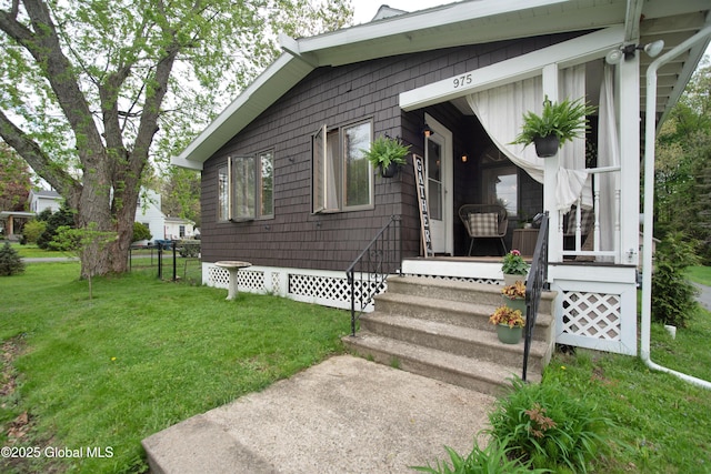 975 Riverview Rd, Schenectady, NY 12309 - view of front of home featuring a front lawn and covered porch