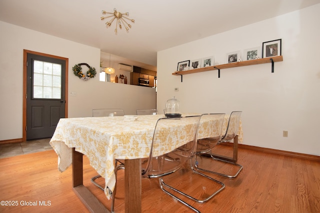 975 Riverview Rd, Schenectady, NY 12309 - dining room featuring baseboards and light wood-style flooring