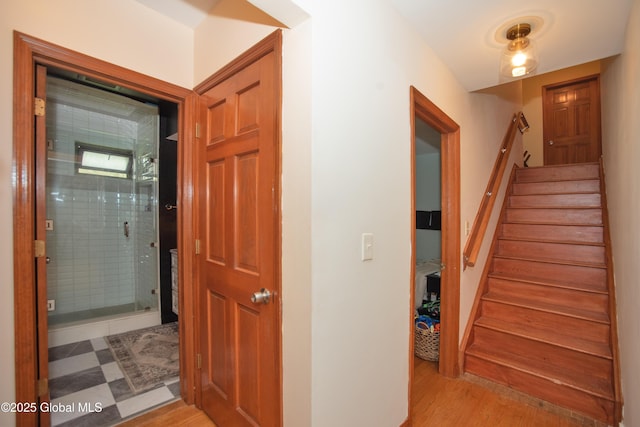 975 Riverview Rd, Schenectady, NY 12309 - hallway with stairway and wood finished floors